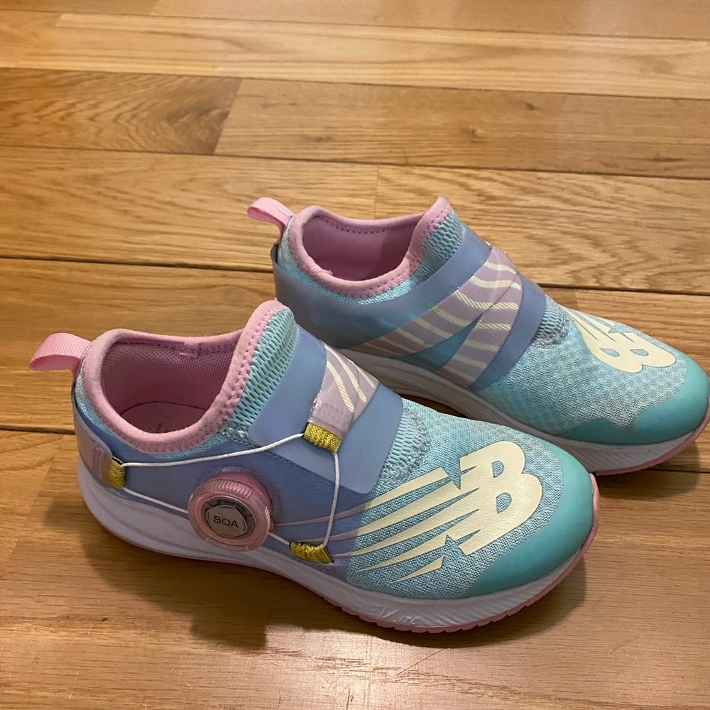 Click and tighten New Balance kids shoes